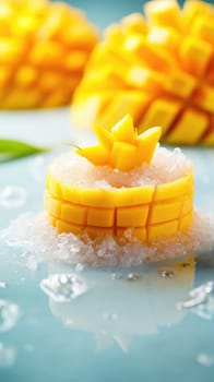 Mango slices are sitting on top of a blue surface