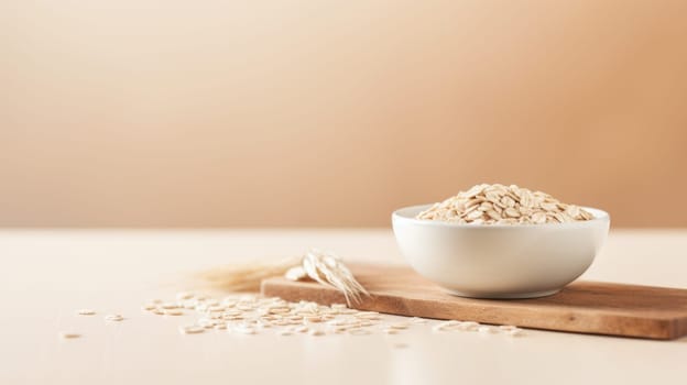Bowl of oats on wooden board with copy space for your text