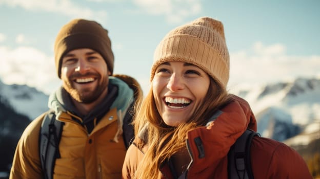 A couple smiling while hiking in the mountains