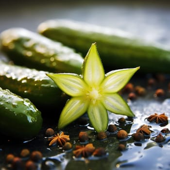 Pickles with star and spices on a dark surface