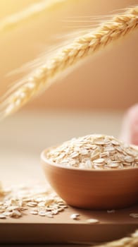 A bowl of oats and wheat on a wooden table