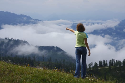 Austria the tourist watching beautiful panorama of the mountains
