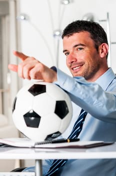 Business man with football