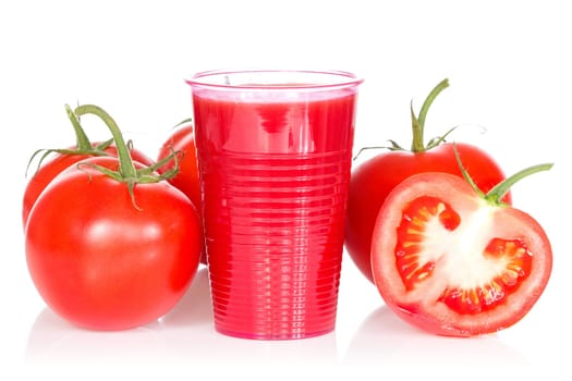 Ripe tomatoes tomato juice and  on white background