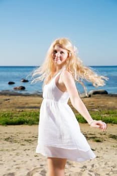 Rotating woman with white flower in gold hairs