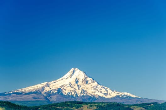 Beautiful snow covered Mt. Hood and a deep blue sky in Oregon, USA