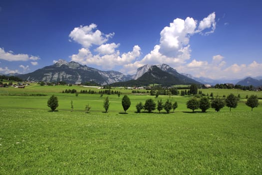 austria large panorama of the mountains above the blue sky