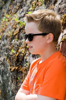 Boy with Sunglasses and Orange T-Shirt