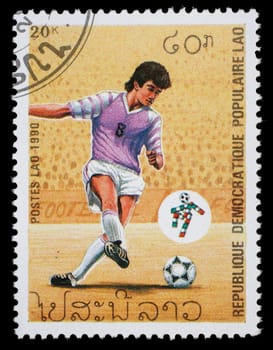 LAOS - CIRCA 1990: stamp printed by Laos, shows football championships, circa 1990.