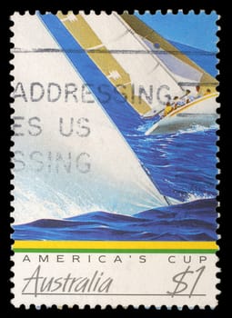 AUSTRALIA - CIRCA 1986: A stamp printed in Australia shows image of a yacht competing the America's Cup, circa 1986