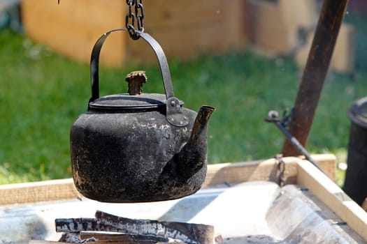 Water boiler over a fireplace