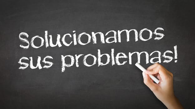 A person drawing and pointing at a We Solve Problems Chalk Illustration