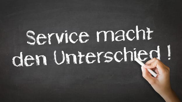 A person drawing and pointing at a Service makes the difference Chalk Illustration