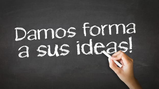 A person drawing and pointing at a We Shape Your Ideas Chalk Illustration