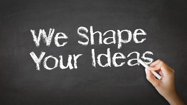 A person drawing and pointing at a We Shape Your Ideas Chalk Illustration