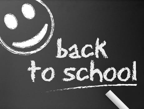 Dark chalkboard with a back to school illustration.