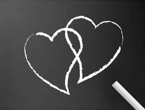 Dark chalkboard background with two hearts illustration.