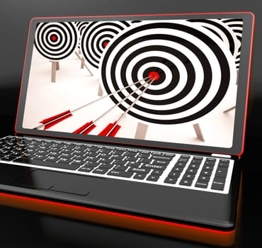 Target Hit On Laptop Showing Perfect Shot Or Precise Aiming