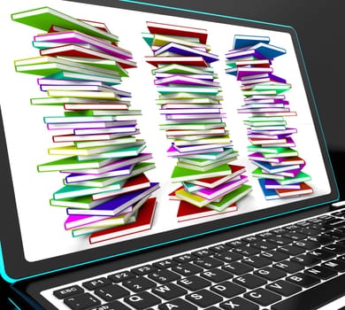 Pile Of Books On Laptop Showing Studying And Learning