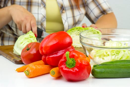 woman cutting vegetables
