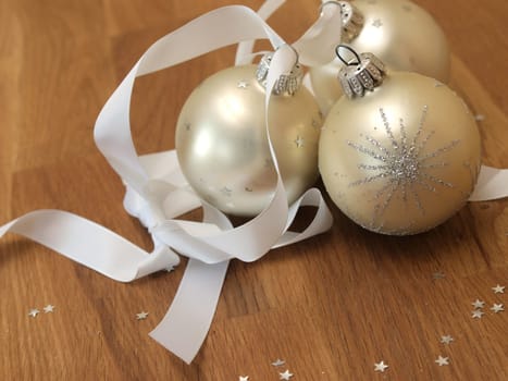 Christmas baubles on a wooden background
