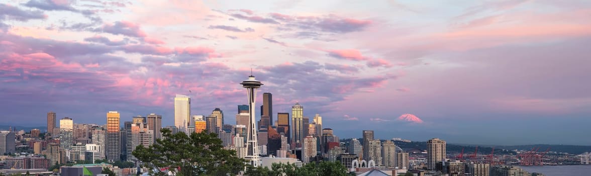 Seattle Washington City Downtown Skyline with Puget Sound and Mount Rainier at Sunset Panorama