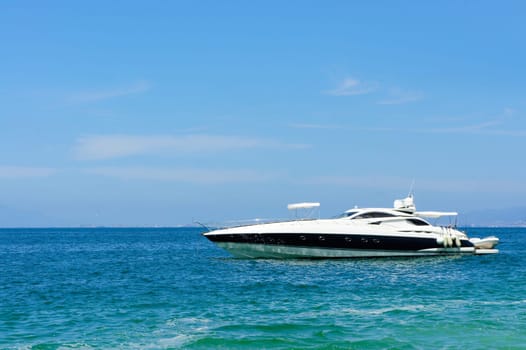 Luxury Boat crusing slowely in the tropics.