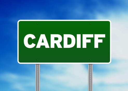 Green Cardiff, England highway sign on Cloud Background.
