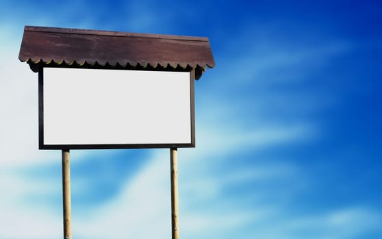 Wooden hand made sign on cloud background.