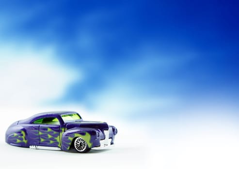 Tail Dragger replica car on cloud background.