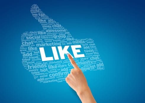 Hand pointing at a Like Thumb on blue background.