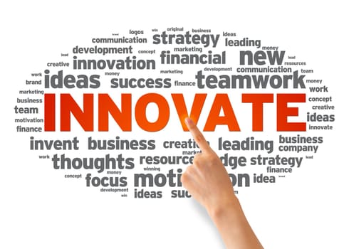 Hand pointing at a Innovate Word illustration on white background.