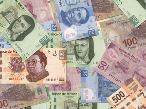 Mexican Peso bills scattered randomly all over.