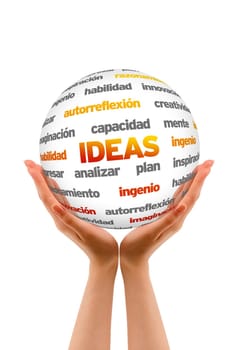 Hands holding a 3D Ideas Word Sphere on white background.