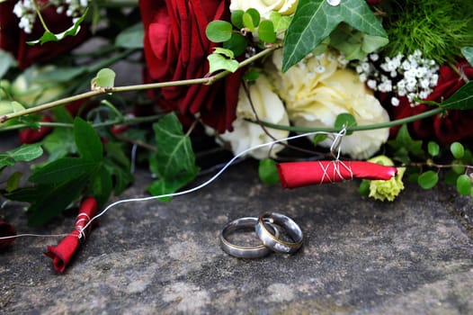 wedding rings and flowers