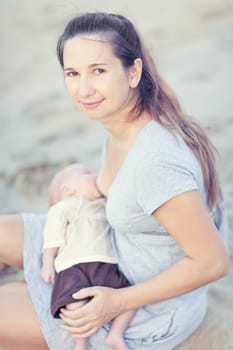Mother breastfeeding a baby outdoor