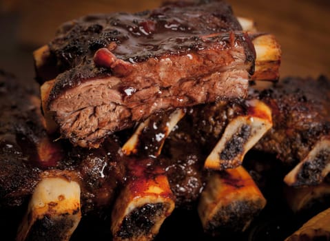 Beef ribs being roasted on the BBQ.