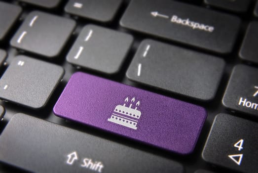 Entertainment key with Birthday cake icon on laptop keyboard. Included clipping path, so you can easily edit it.