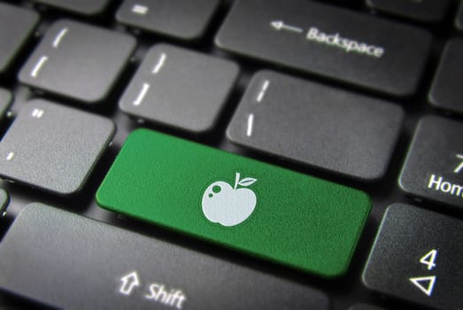 Love key with fruit icon on laptop keyboard. Included clipping path, so you can easily edit it.