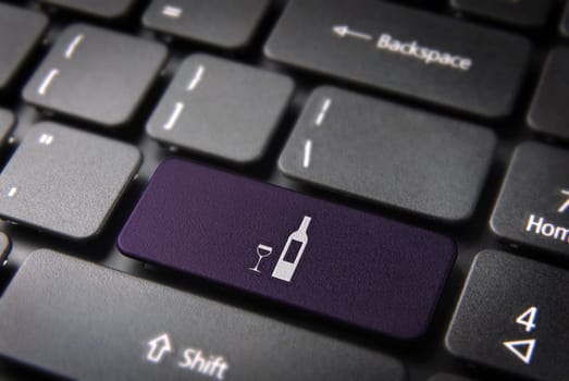 Food key with Wine bottle and cup icon on laptop keyboard. Included clipping path, so you can easily edit it.