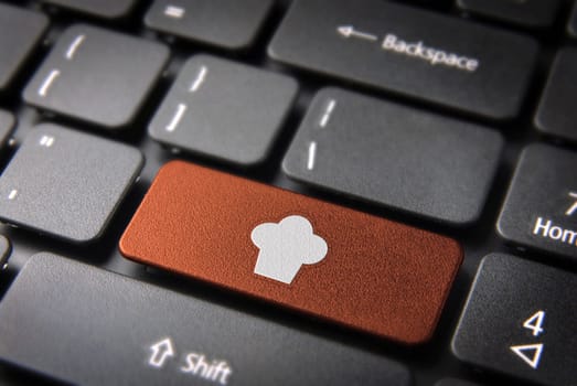 Gourmet key with Chef hat icon on laptop keyboard. Included clipping path, so you can easily edit it.