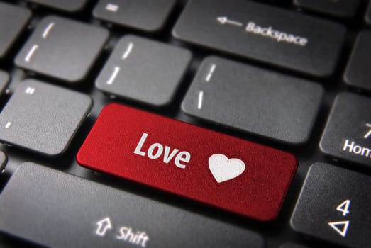 Valentines key with heart icon and love word on laptop keyboard. Included clipping path, so you can easily edit it.