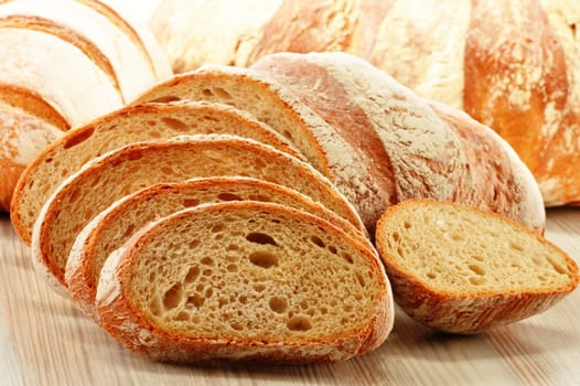 Composition with loafs of bread isolated on white background