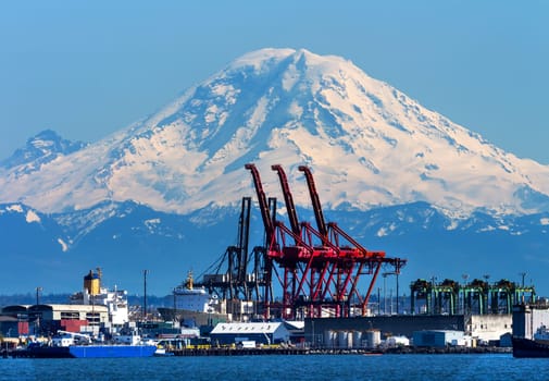 Seattle Port with Red Cranes Ships and Mt Rainier in the Background