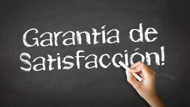 A person drawing and pointing at a Satisfaction garantied Chalk Illustration