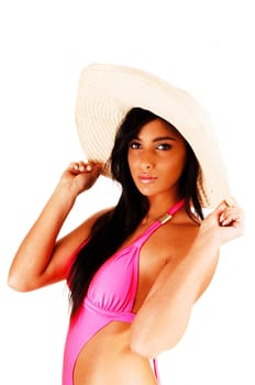 A closeup picture of a beautiful teen girl in a bikini for white background,.wearing a big beige sunhat, with her long brunette hair..