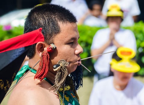 Phuket Vegeterian Festival. Shocking asian tradition - body piercing.