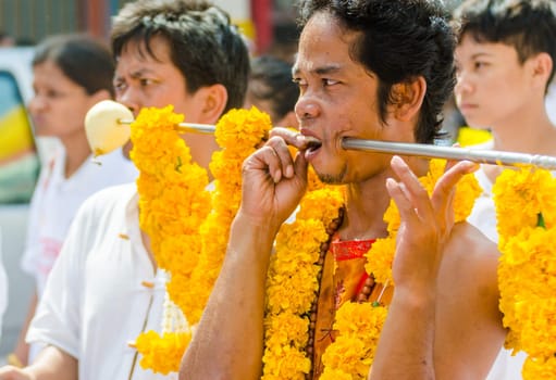 Phuket Vegeterian Festival. Shocking asian tradition - body piercing.