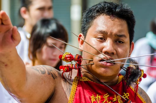 Phuket Vegeterian Festival. Shocking asian tradition - body piercing.