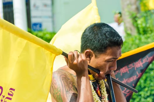 Phuket Vegeterian Festival. Shocking asian tradition - body piercing.